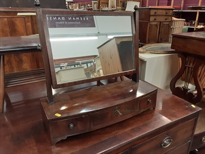 Lot 882 - Georgian mahogany toilet mirror with three drawers