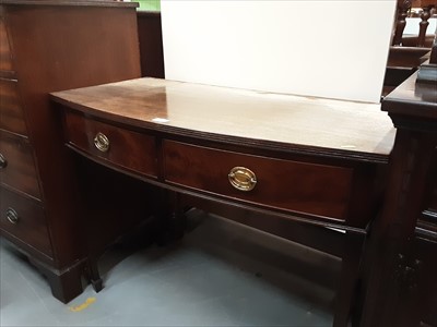 Lot 880 - Georgian style mahogany bow front table with two drawers