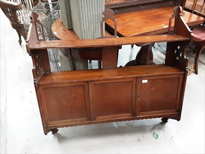 Lot 960 - Edwardian oak hanging wall shelf with cupboards below