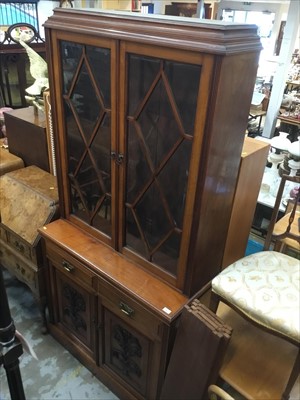 Lot 986 - Edwardian walnut Two height bookcase