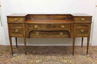 Lot 853 - George III mahogany and line inlaid bowfront sideboard