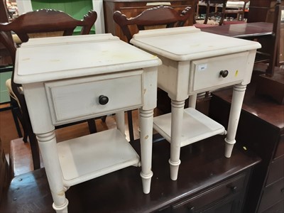 Lot 884 - Pair of cream two tier bedside tables with single drawer