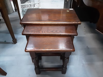 Lot 896 - Oak nest of three tables