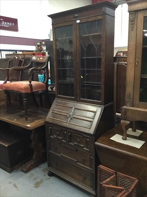 Lot 931 - 1920s oak bureau bookcase