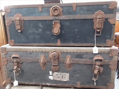 Lot 900 - Three vintage metal bound trunks