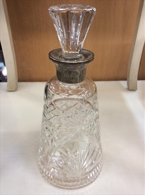 Lot 677 - Cut glass decanter with silver mount