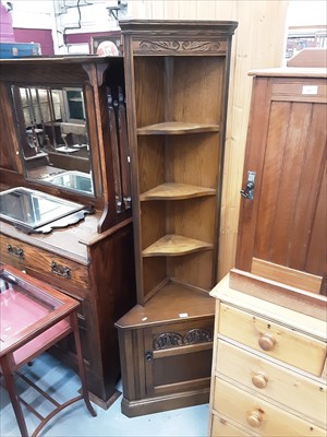 Lot 916 - Old Charm oak two height corner cupboard with open shelves and carved panelled door below