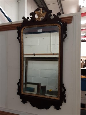 Lot 958 - George II style fretwork wall mirror with gilt slip and eagle surmount