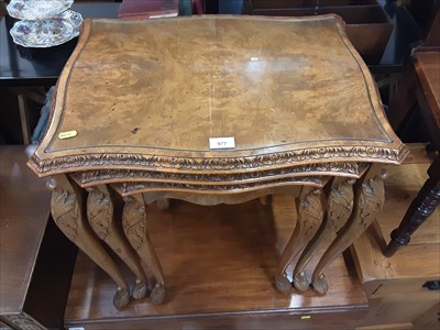 Lot 977 - Good quality 1950s carved walnut nest of three coffee tables with inset plate glass tops and carved cabriole legs