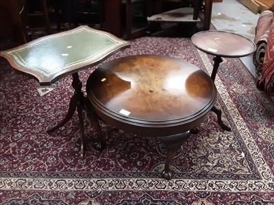 Lot 973 - Walnut circular occasional table and two mahogany wine tables