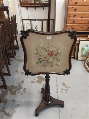 Lot 1032 - William IV rosewood pole screen with silk embroided floral panel within shaped frame, on trefoil base