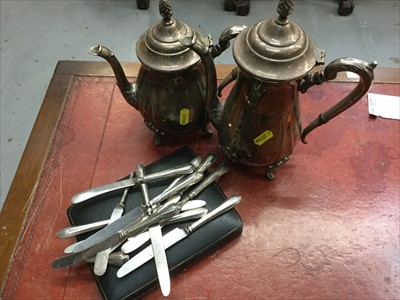 Lot 687 - Group of silver handled tea knives together with a silver plated teapot and coffee pot