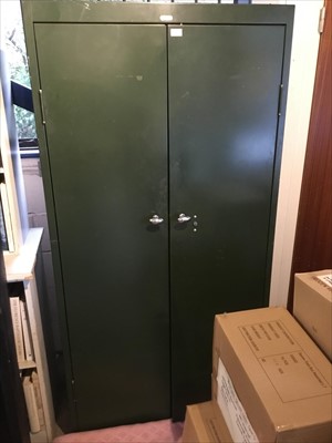 Lot 1089 - Vintage green metal cupboard with shelves