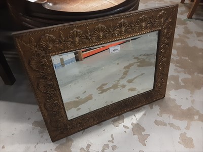 Lot 1090 - Wall mirror in ornate brass frame
