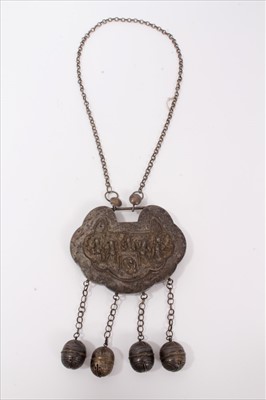 Lot 4 - Old Chinese white metal necklace with embossed panel depicting figures and Chinese characters, with chain and bells
