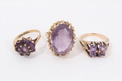 Lot 172 - Three 9ct gold amethyst dress rings