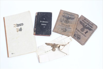 Lot 694 - Group of Second World War Nazi Wehrmacht Panzer Division pass, together with a Ostpreuken Werwolf pass and Other documents and badges