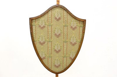Lot 1375 - Regency polychrome painted satinwood polescreen