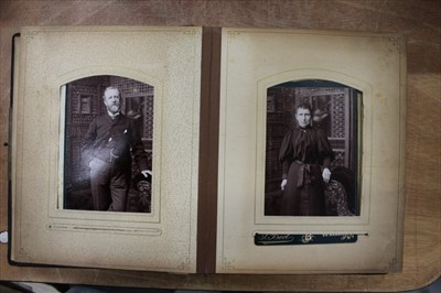 Lot 1222 - Postcards and photographs in ten albums, including early shipping, Louis Wain , real photographic, social history etc.