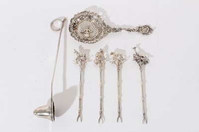 Lot 270 - Set of four silver pickle forks, together with a Dutch spoon, and a candle snuffer
