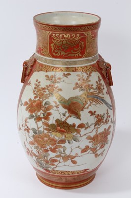 Lot 98 - Late 19th century Japanese Kutani vase, of baluster form with beast mask handles, painted with figures, birds and flowers, 27.5cm height