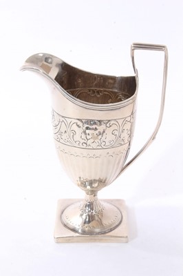 Lot 268 - Regency silver milk jug of helmet form