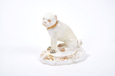Lot 120 - A Derby model of a seated pug, picked out in gilt, circa 1820-30