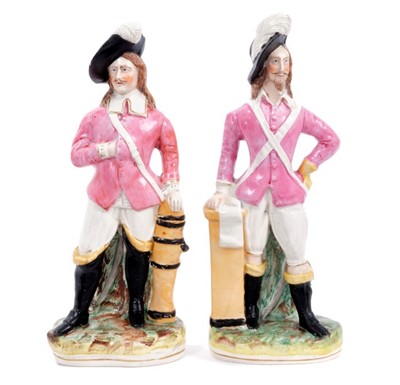 Lot 105 - Rare pair of Victorian Staffordshire pottery figures of Charles I and Prince Rupert, both wearing plumed hat, doublet and breeches, the tallest measuring 25.5cm height