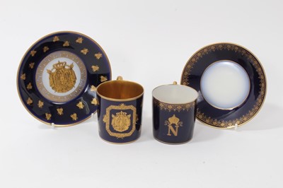 Lot 125 - Two 19th century Sèvres-style cabinet cups and saucers with Napoleon I motifs, together with a Sevres style dish