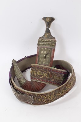 Lot 138 - Mid-20th century Arab Jambia dagger with horn hilt and white metal and brown mounts, with sheath and original woven belt