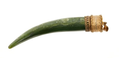 Lot 503 - 19th century Indian gilt metal mounted spinach jade jewel