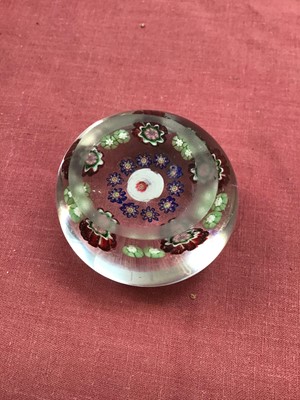 Lot 116 - Fine 19th century French glass paperweight with central white and red rose with floral border, 4.5cm
