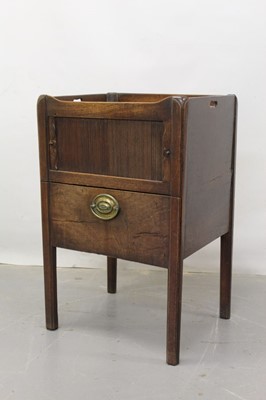 Lot 1281 - George III mahogany pot cupboard with tambour slide front