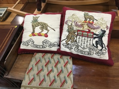 Lot 1047 - Two armorial tapestry cushions and one other