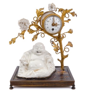 Lot 600 - Unusual 19th century French desk clock in the Louis XV style, with ormolu branch on chinoiserie ornamented bronze base mounted with blanc-de-Chine Buddha figure, 18cm wide