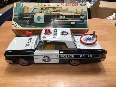 Lot 318 - 1960s Japanese Daiya tinplate friction powered police car P.D.110 in original box- near mint condition