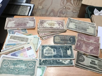 Lot 319 - Banknotes selection of WW2 Japanese Government invasion currency with values to $ 1000 (x2) $ 100(x2) plus others and World selection (qty)