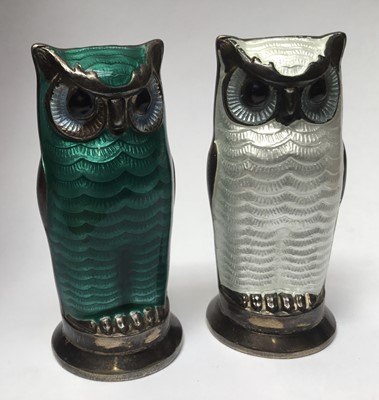 Lot 191 - Mid 20th century Norwegian silver and enamel owl pepper pots by David Anderson , one in white and the other in green enamel 55mm high