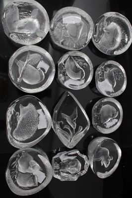 Lot 998 - Collection of twelve Mats Jonasson Swedish glass intaglio sculptures
