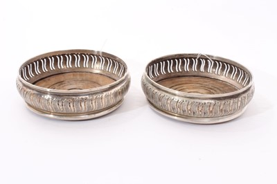 Lot 256 - Pair of Georgian style silver wine coasters
