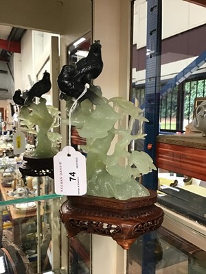 Lot 74 - Chinese carved hardstone group of hawks in trees, carved hardwood base