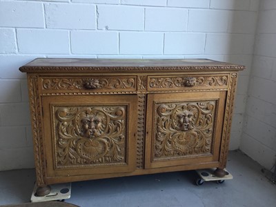 Lot 20 - Edwardian heavily carved oak side board