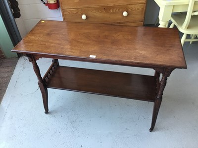 Lot 17 - Edwardian Mahogany two tier occasional table with turned fluted column and legs on brass and ceramic castors, 114cm length, 74cm height, 48cm depth