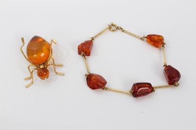 Lot 453 - Amber spider brooch and an amber bracelet