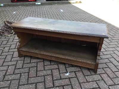 Lot 79 - Early 20th Century carved oak hall seat, with undertier, 130cm in length, 55cm in height, 50cm in depth