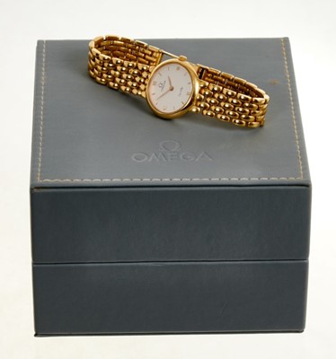 Lot 554 - 18ct gold Omega wristwatch in box with documents