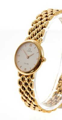 Lot 554 - 18ct gold Omega wristwatch in box with documents