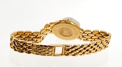 Lot 554 - 18ct gold Omega wristwatch in box with documents