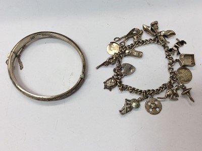 Lot 718 - Silver charm bracelet and silver bangle