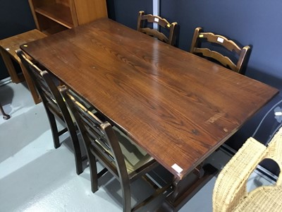 Lot 138 - Oak refectory table with pierced ends joined by stretcher together with four ladder back dining chairs, 152 x 76 x 76cm